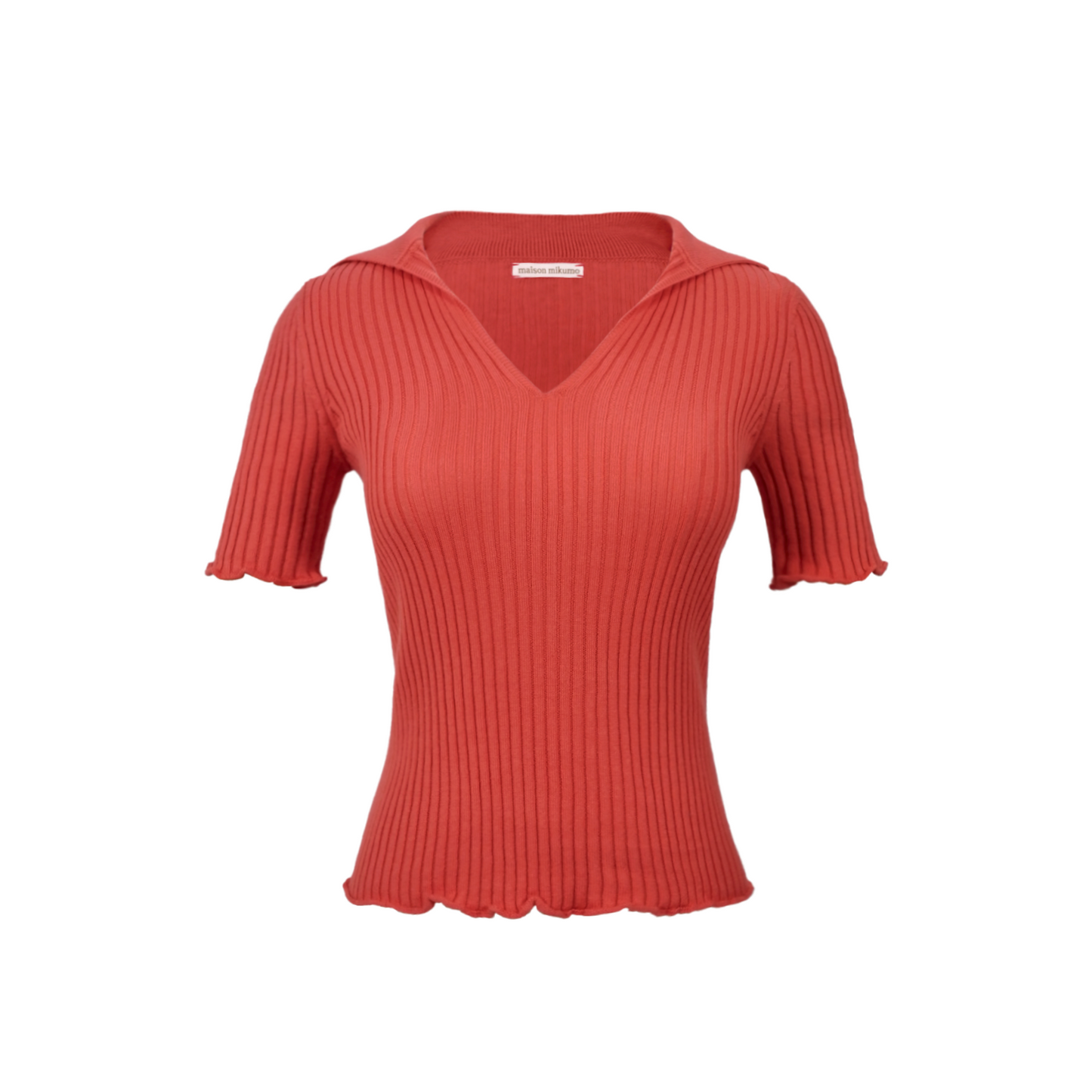 Coral rib knit short sleeve polo on a white background