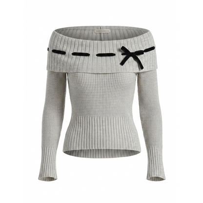 Gray ribbed sweater with black bow details on a white background
