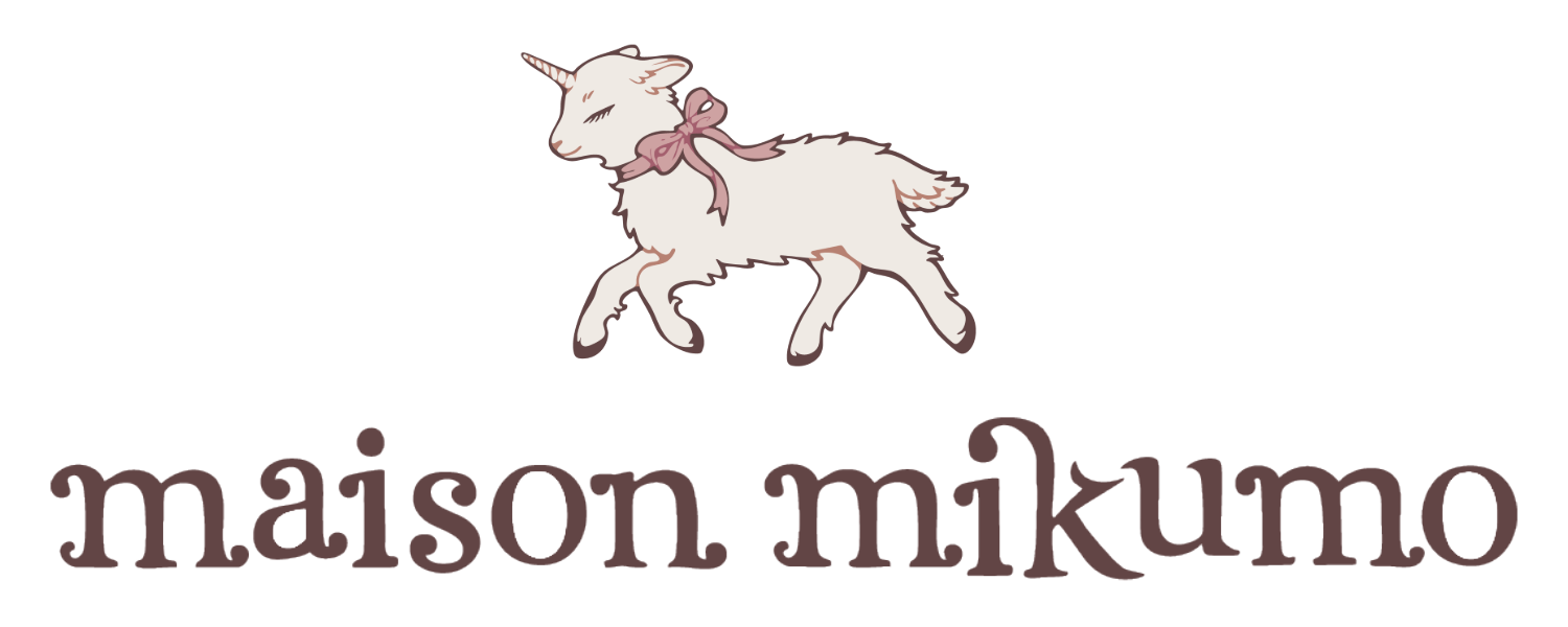 cute logo reading "maison mikumo" with their mascot, miku, a unicorn sheep.